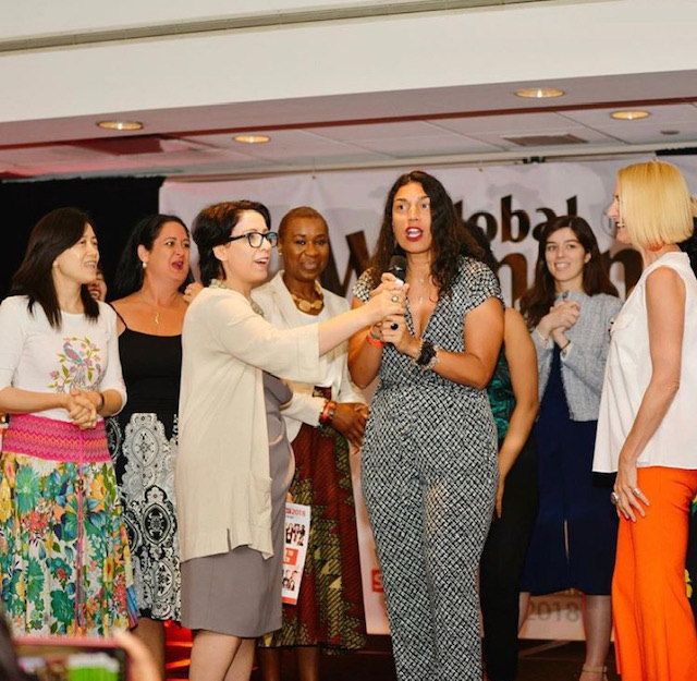 Wendy Perdomo delivering a keynote presentation